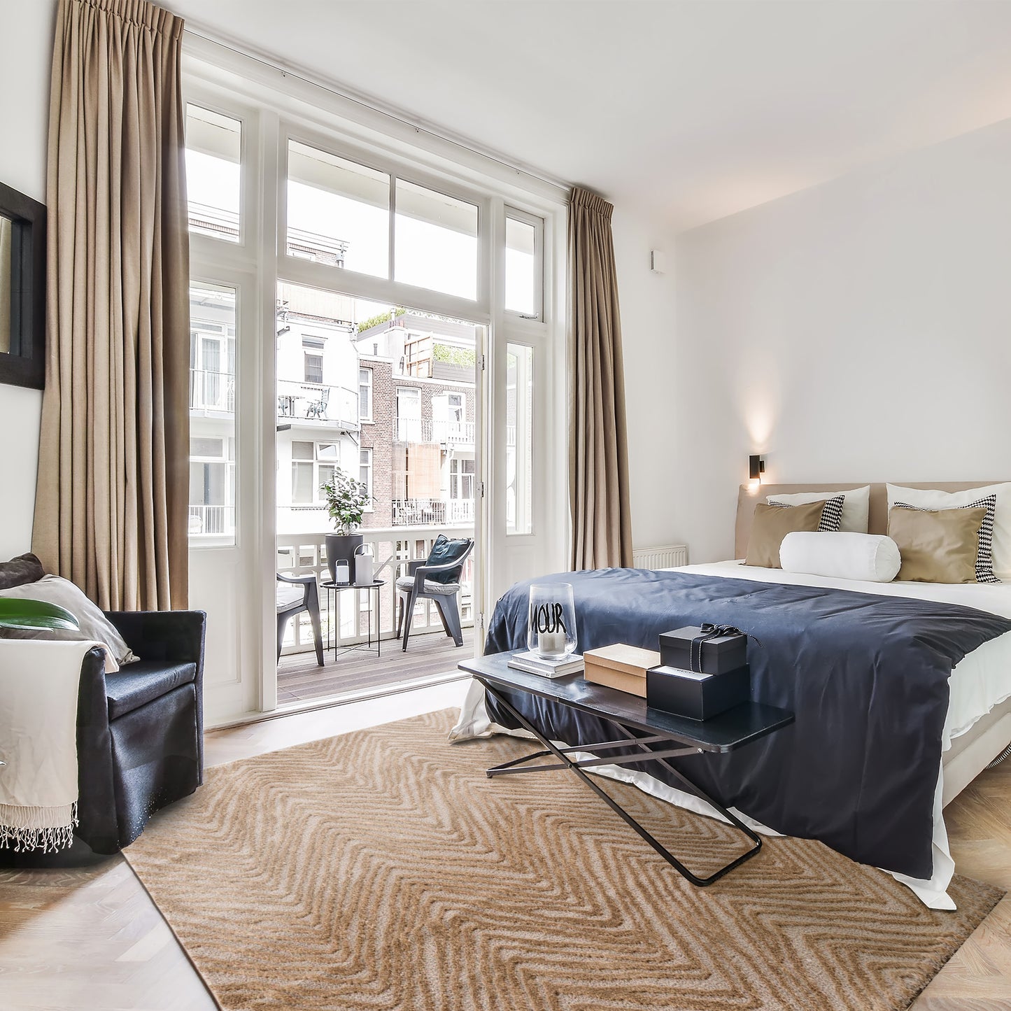Istanbul Tufted Rug in a bright modern bedroom with balcony and large windows