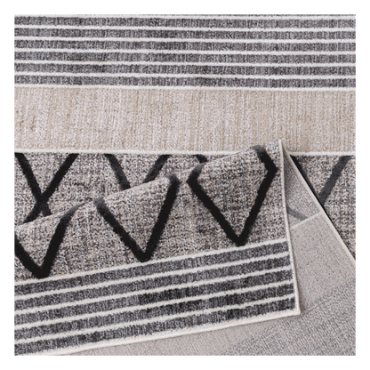 Folded Smyrna Midnight Rug and its backing